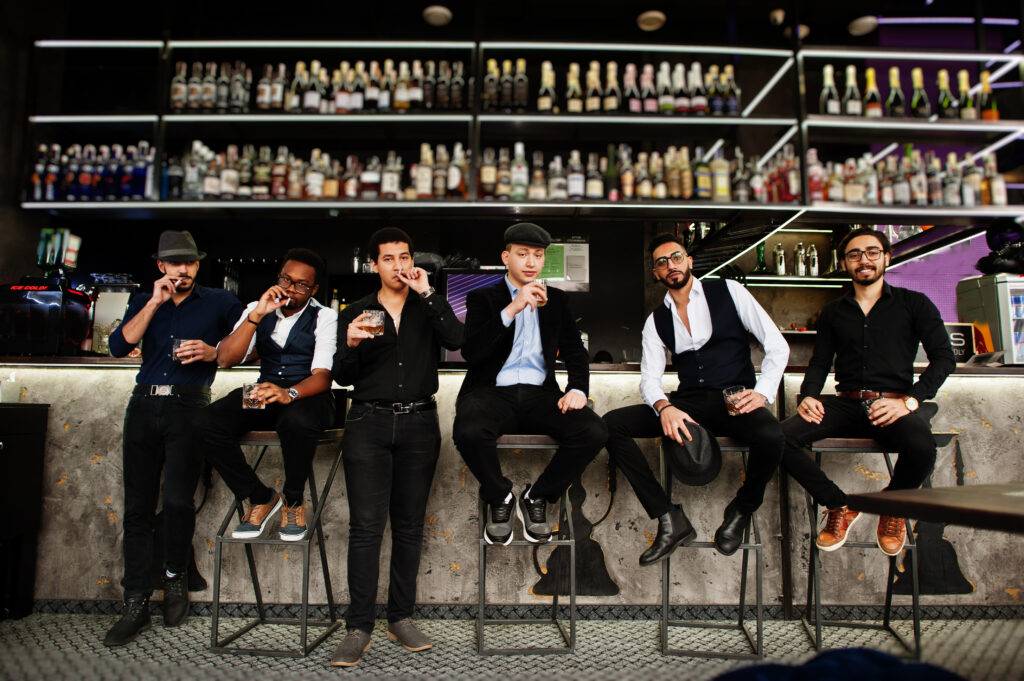 Retro gangster-styled men gathered together in a group, used for a ‘What’s Your Case Worth?’ concept.