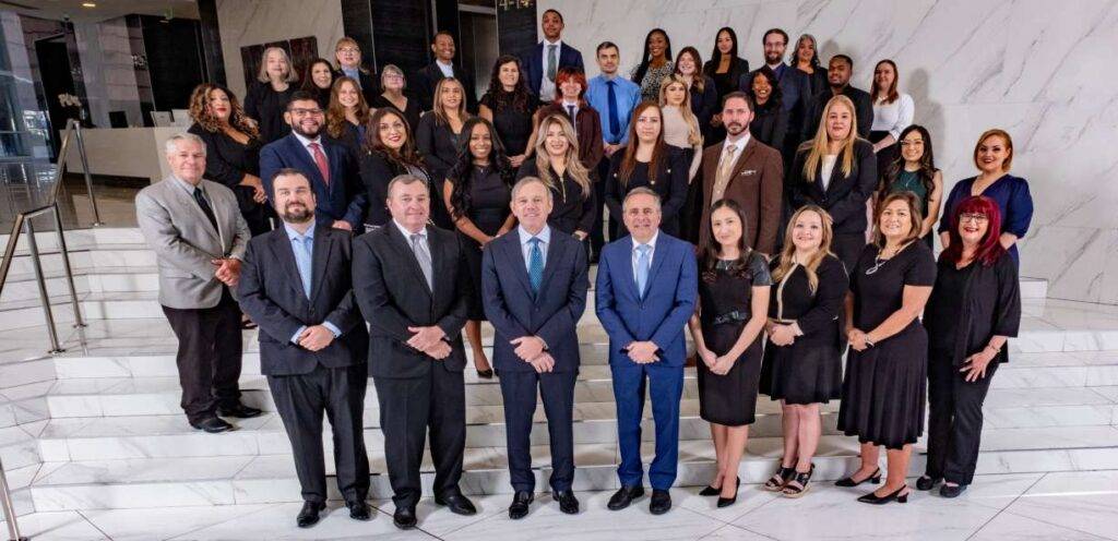 Group of lawyers standing together in a professional setting
