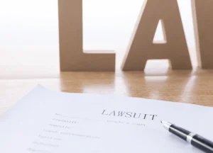 Mesothelioma lawsuit paperwork showing potential asbestos settlement amounts