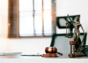 Shook & Fletcher Asbestos Trust Payments & Lawsuits 1 gavel, legal documents, and scales of justice representing asbestos litigation