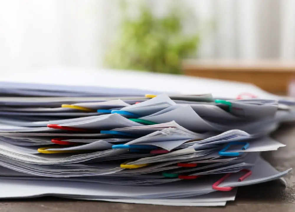Organized legal paperwork related to asbestos exposure claims and compensation.