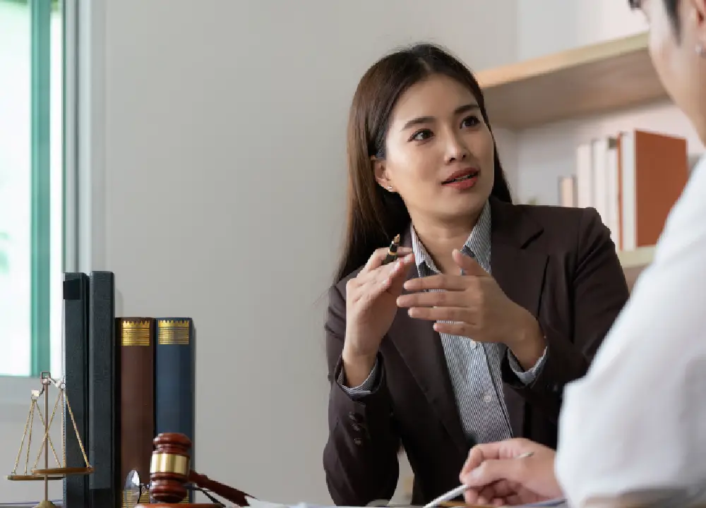 Lawyer providing guidance to a client about mesothelioma compensation