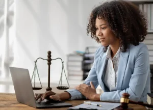 Mesothelioma lawyer reviewing legal documents and case files for an asbestos exposure claim